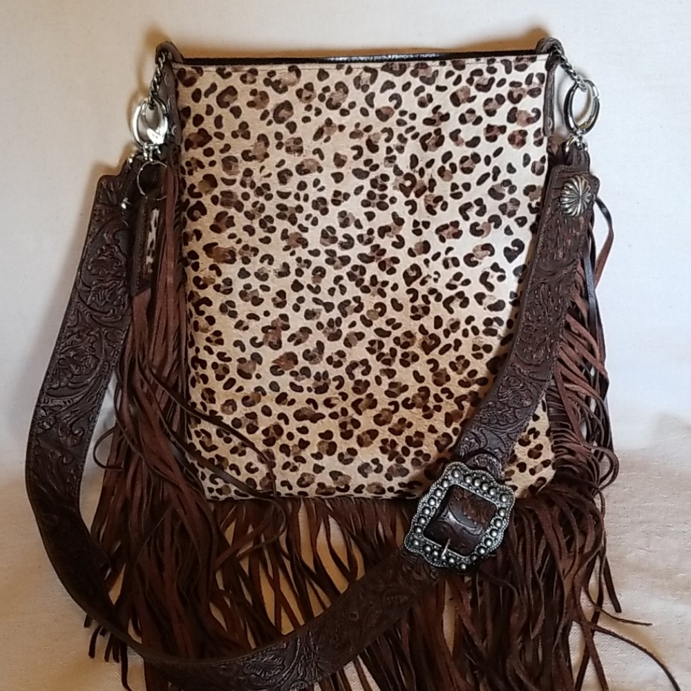 Leopard print 3 sided fringe crossbody bag.
